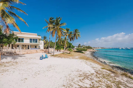 8-bedroom beachfront villa in Malmok Aruba with direct sandy beach access